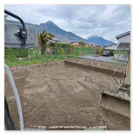 Terrassement d'une surfave pour créer des places de parcs sur la commune d'Ardon